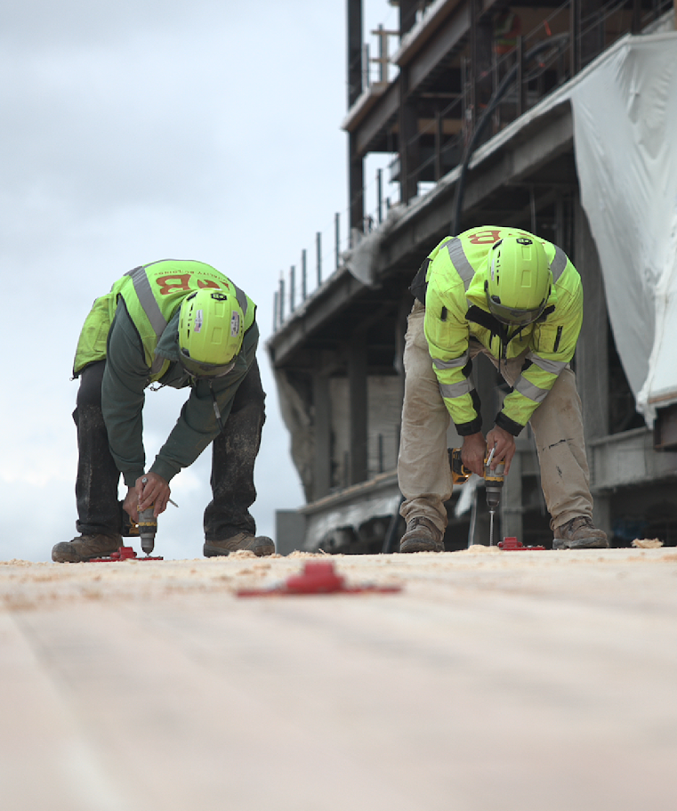Quality Buildings crew installing mass timber